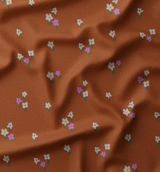 coupon 135/ Ribfluweel - Roest met kleine bloem